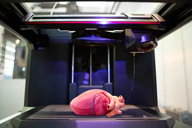 3D printer with a printed heart. 