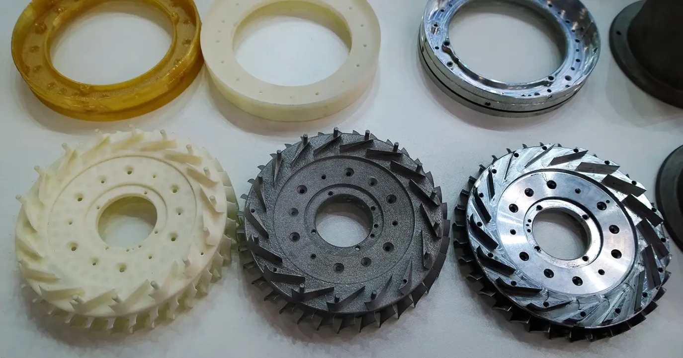 Various mechanical components produced by a 3D printer.